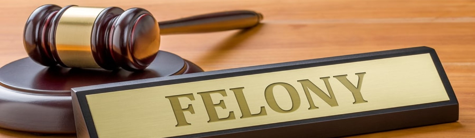 Felony: Crime that carries a sentence of more than one year in jail or prison